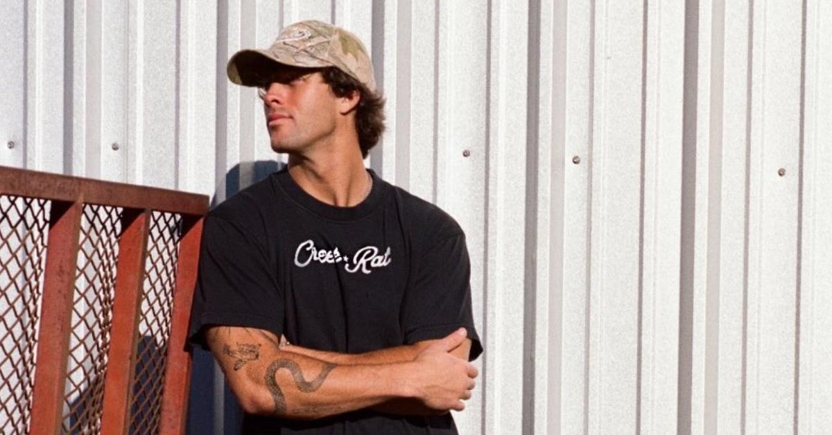 Rob Rausch posing for his clothing line, Creek Rat