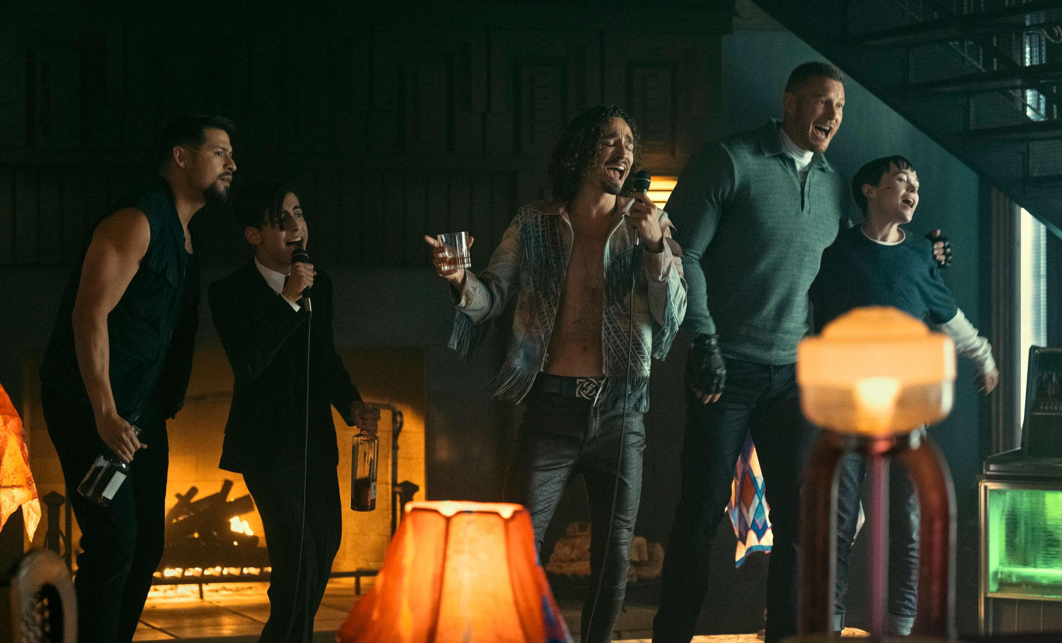 Diego, Five, Klaus, and Viktor perform karaoke at Luther's bachelor party in Season 3 of 'The Umbrella Academy.'