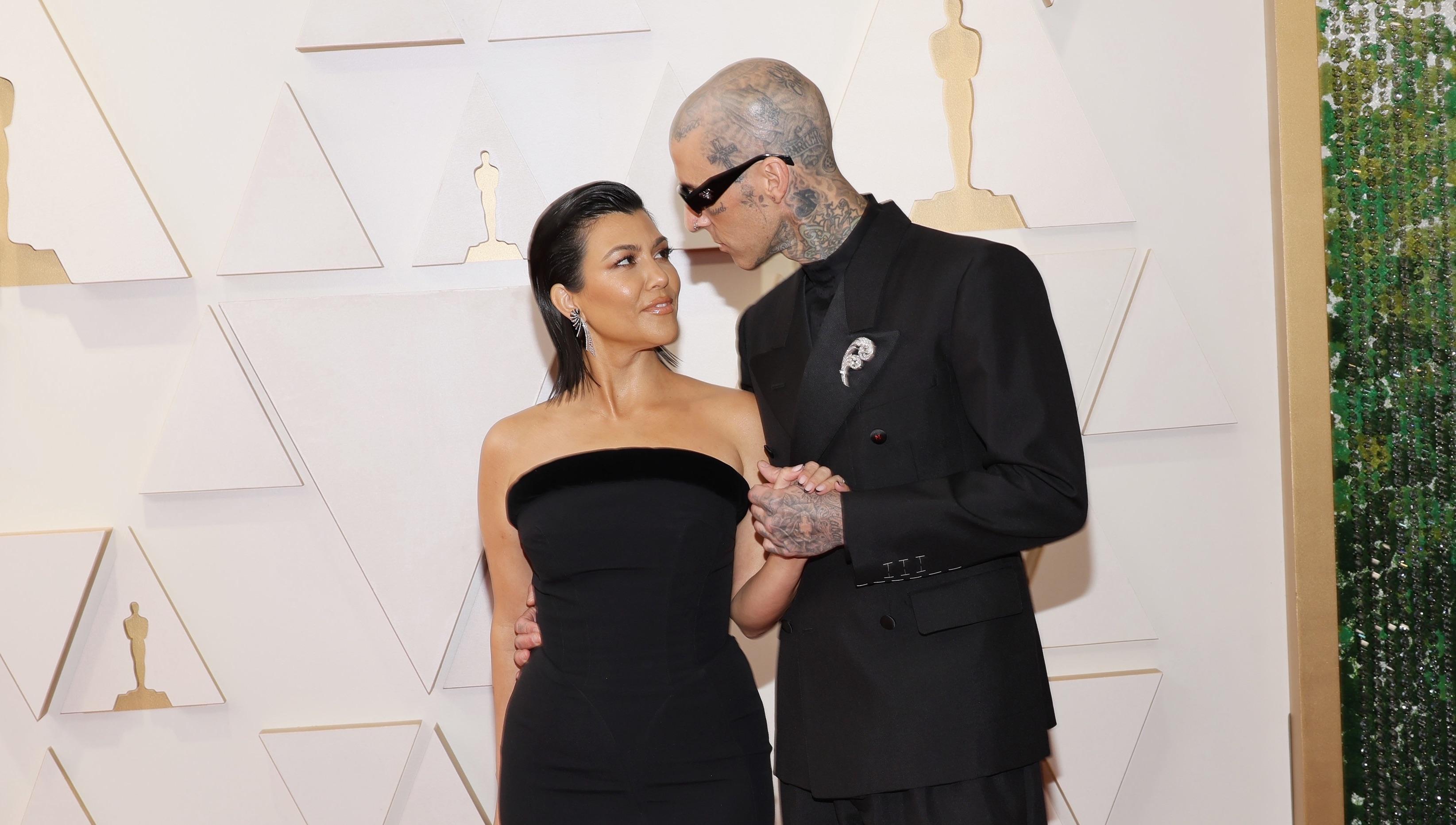 Travis Barker and Kourtney Kardashian at the 2022 Oscars.