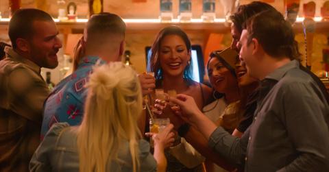 The cast of 'Selling the City' smiles and takes shots together.