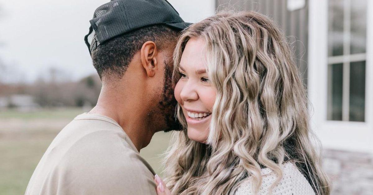 Elijah Scott hugs Kailyn Lowry in a photo as Kailyn looks off camera