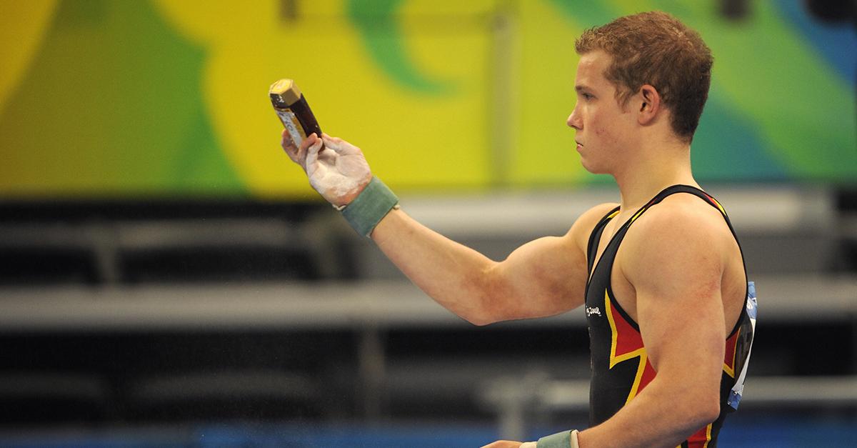 A male gymnast uses honey at the 2008 Olympics in Beijing