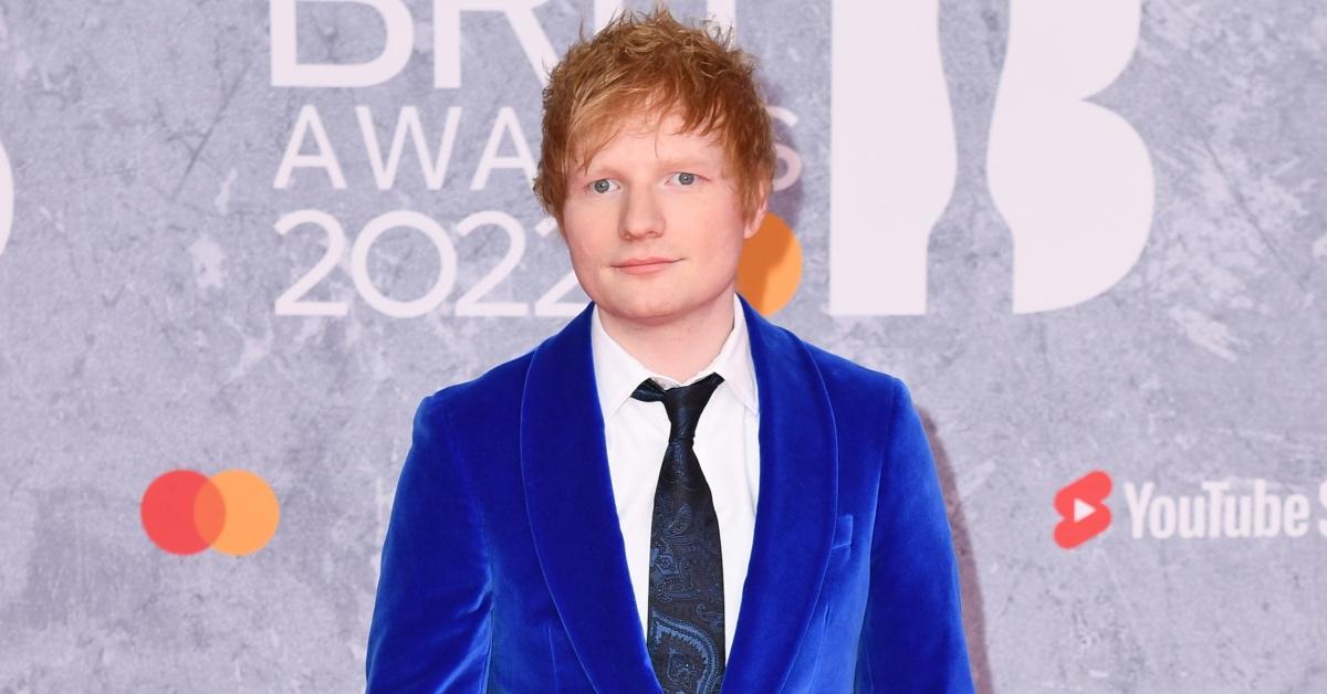 Ed Sheeran walks the red carpet at the 2022 BRIT awards.