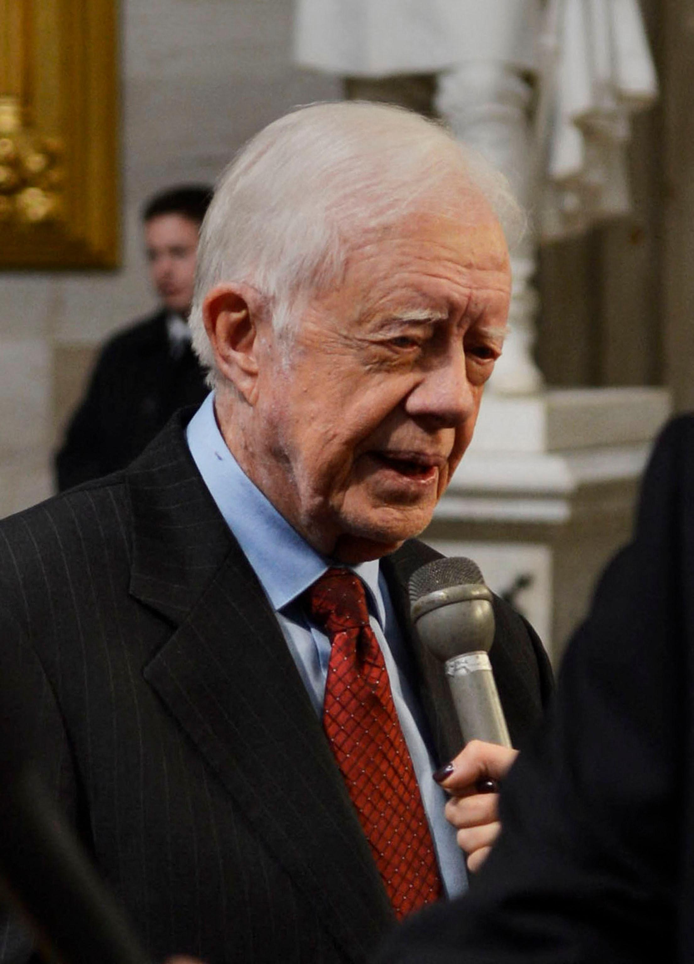 Jimmy Carter speaking to a crowd.