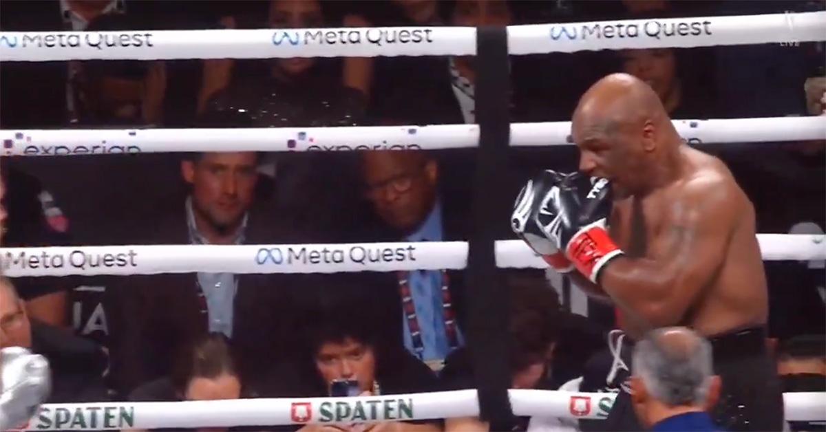 Mike Tyson biting his glove during his fight with Jake Paul. 