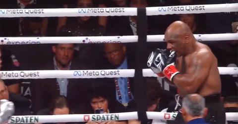 Mike Tyson biting his glove during his fight with Jake Paul.