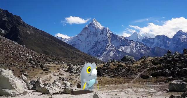 'Pokémon GO' Frigibax walking across a rocky mountain.
