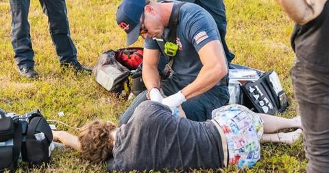 Danny Duncan being worked on by paramedics after an accident