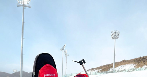 Swiss biathlete Amy Baserga wears tape on her face