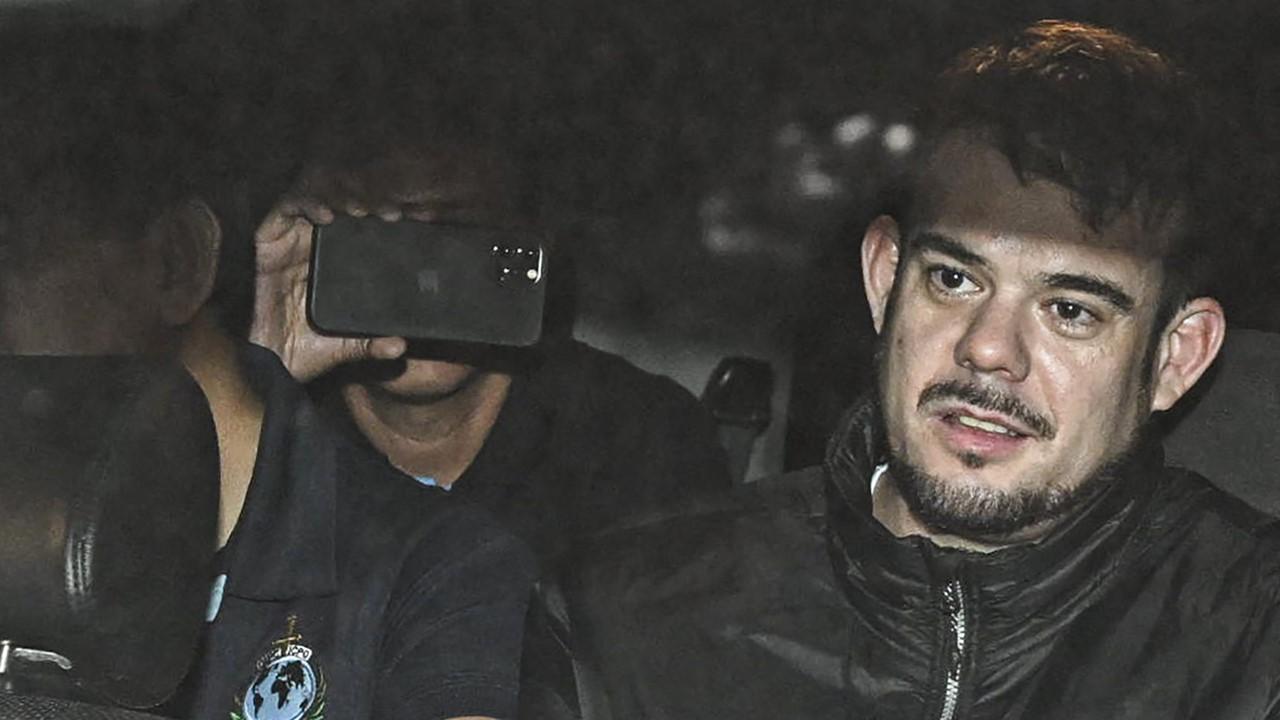 Joran van der Sloot being transferred in a police car from the Ancon I jail in Lima on June 8, 2023.