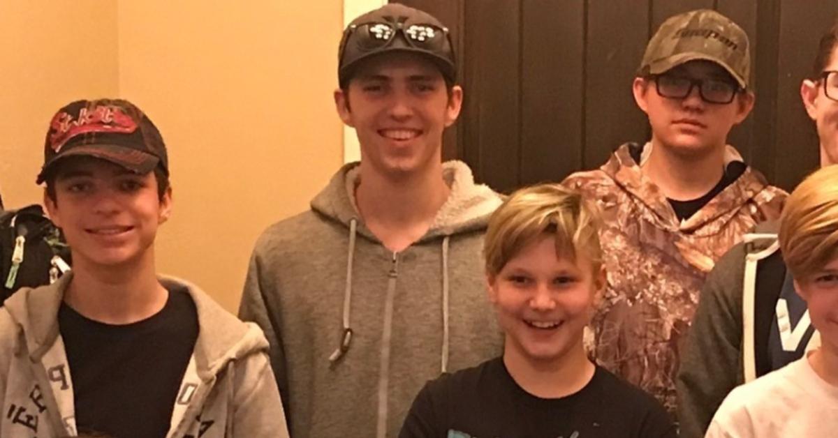 Tyler Robinson (C) with some members of his family