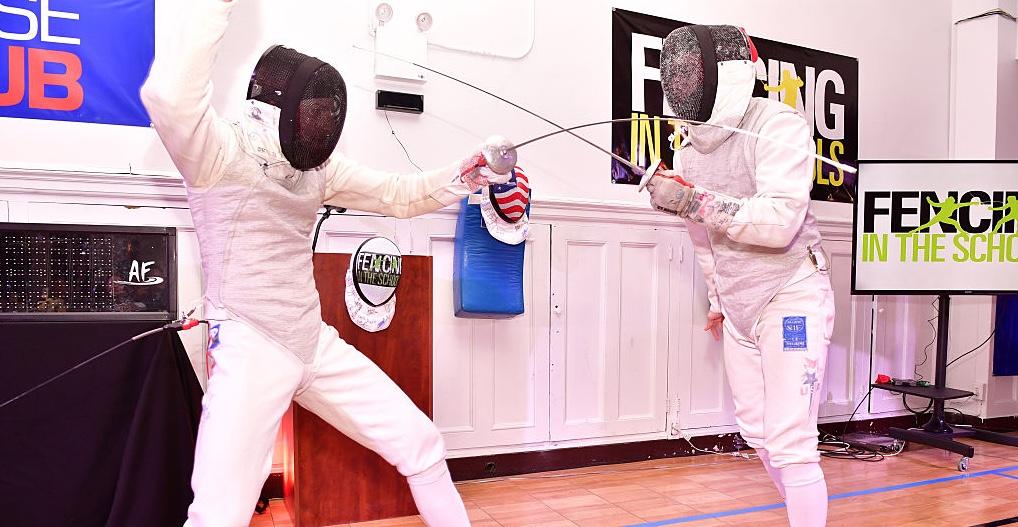 Two fencers fencing