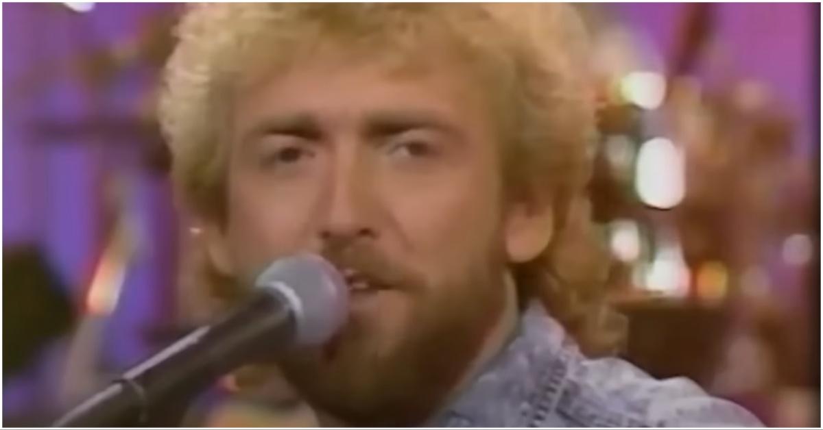 A photo of Keith Whitley singing