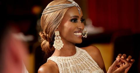 Chanel Ayan looking off camera and smiling