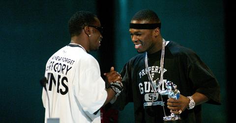 Diddy presenting 50 Cent with an award at the 2003 VMAs.