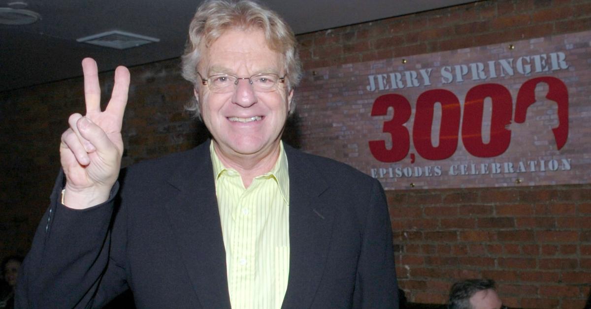 jerry springer making the peace sign 