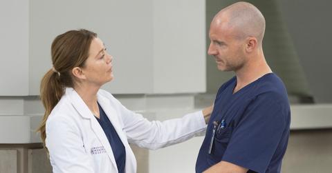 Ellen Pompeo as Meredith Grey and Richard Flood as Cormac Hayes