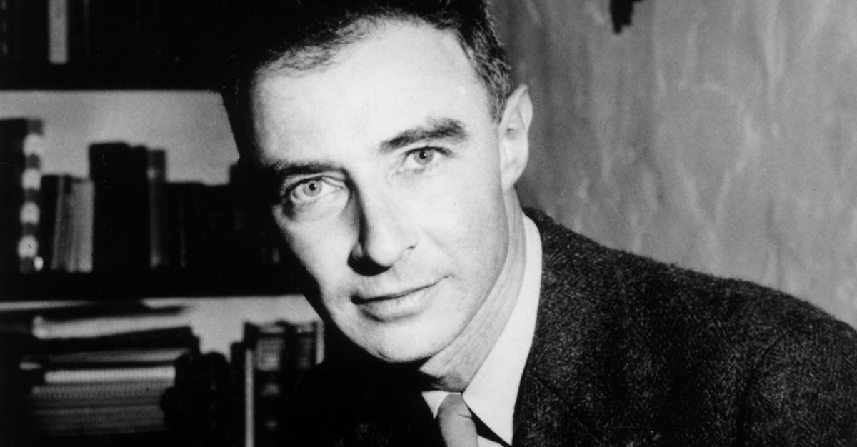 Portrait of American nuclear physicist Dr J Robert Oppenheimer (1904 - 1967), holding an open book, Berkeley, California. 