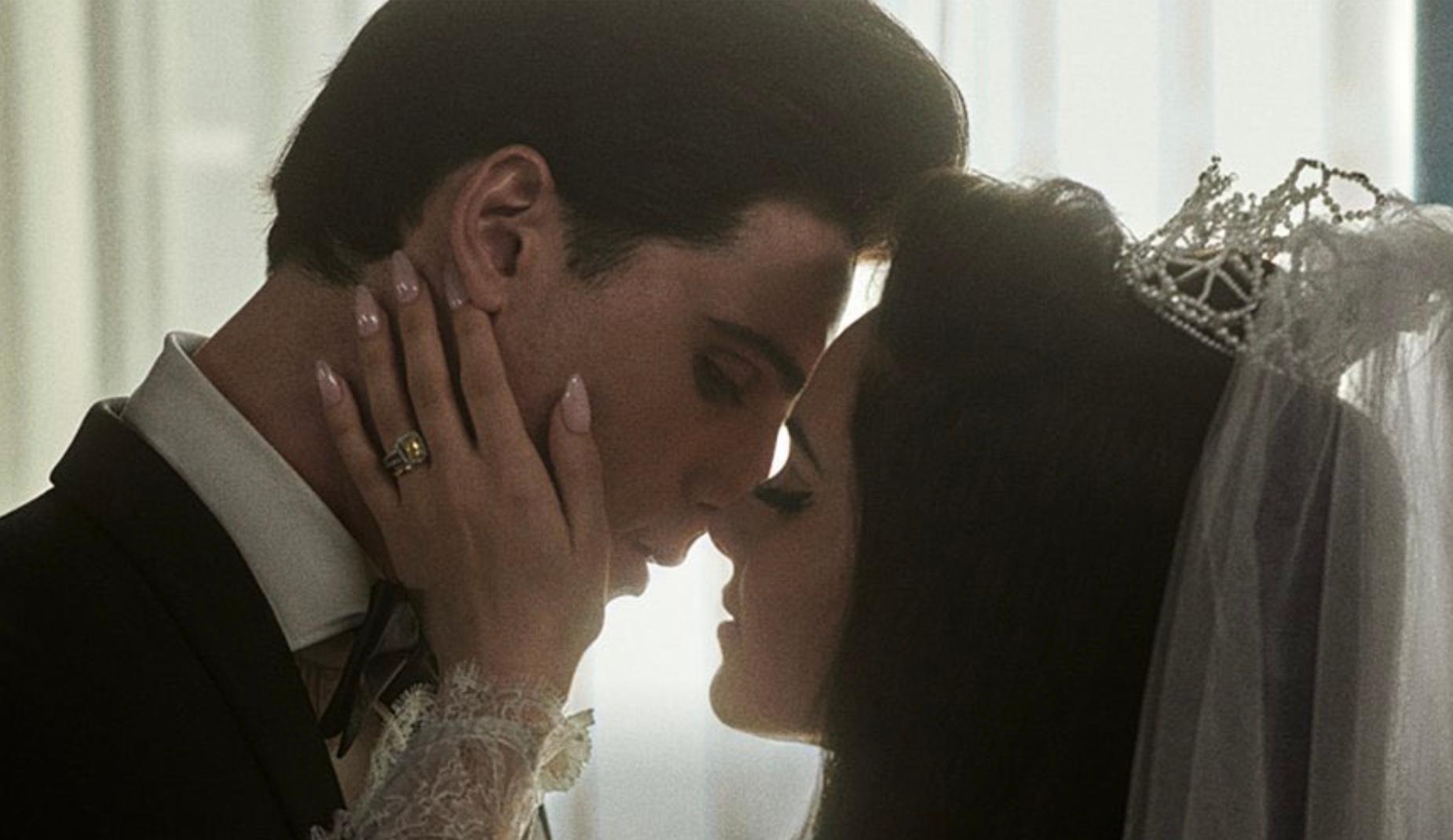 Elvis and Priscilla Presley kissing at their wedding in Sofia Coppola's 'Priscilla'