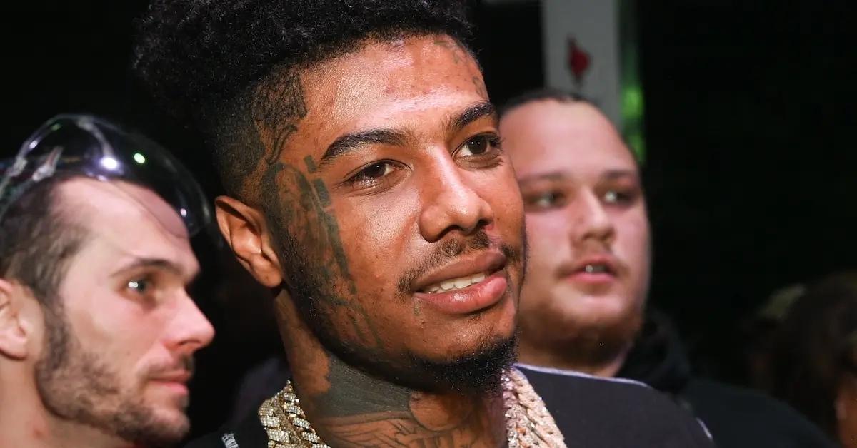 A closeup of Blueface at an event.