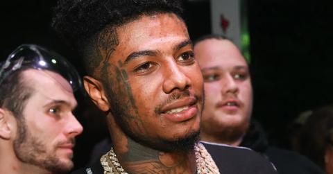 A closeup of Blueface at an event.