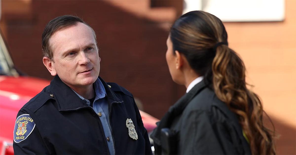 Michael Dixon talking to a woman on 'Station 19.' 