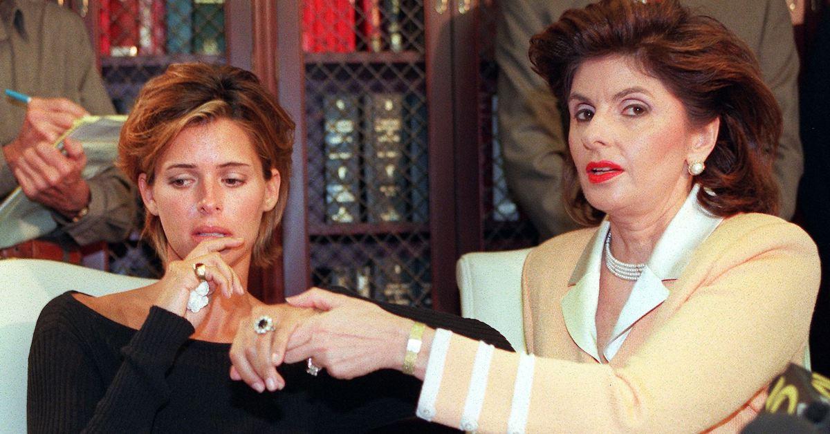 Kelly Fisher, 31, (L) and her attorney Gloria Allred show off the large sapphire and diamond engagement ring given to her by Dodi al-Fayed.