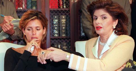 Kelly Fisher, 31, (L) and her attorney Gloria Allred show off the large sapphire and diamond engagement ring given to her by Dodi al-Fayed.