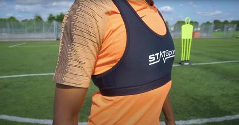 Males soccer players wear stat vests that look similar to sports bras