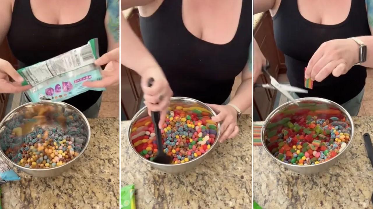 A woman empties different candies into mixing bowl for candy salad