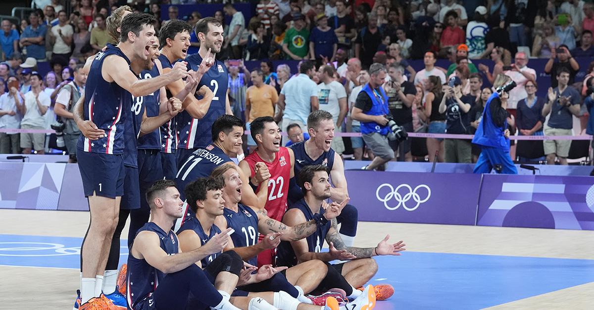 U.S. men's volleyball in a group photo in uniform. 