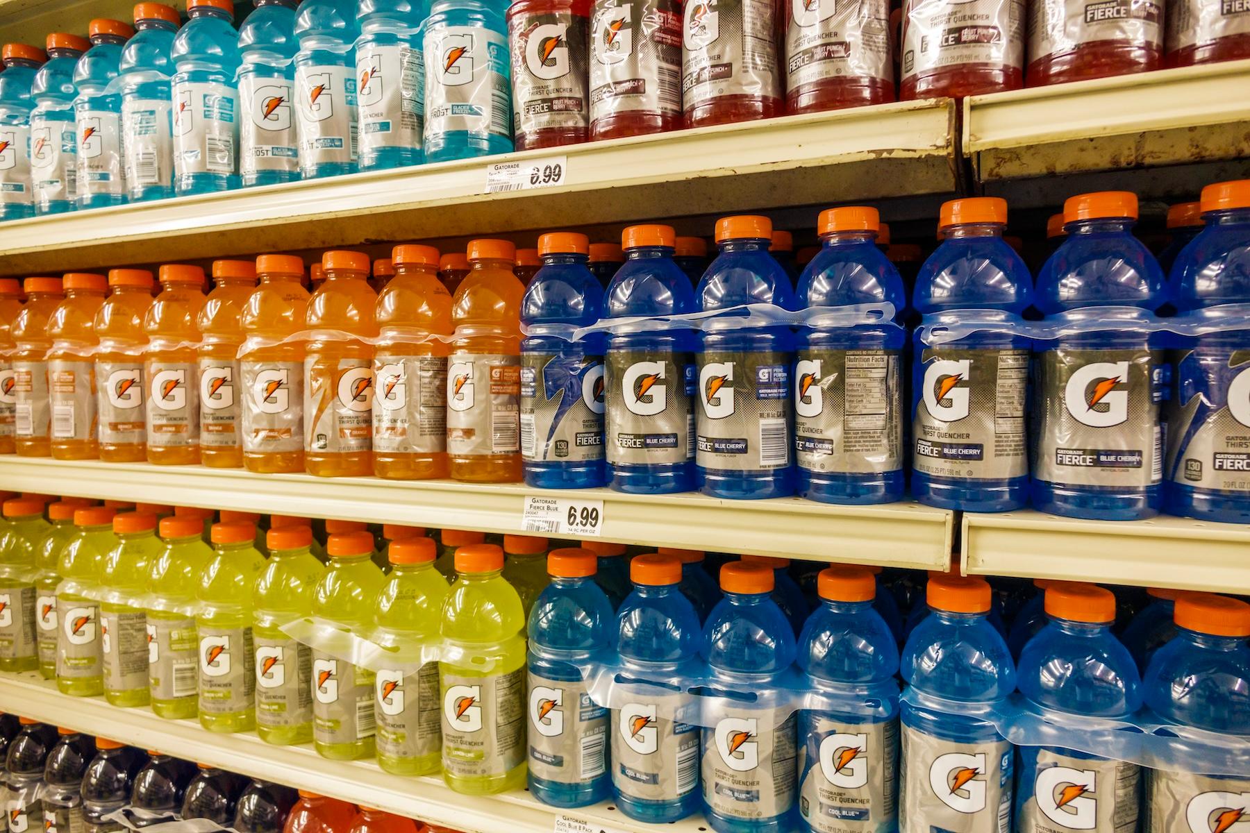 Packs of Gatorade on shelves at a store