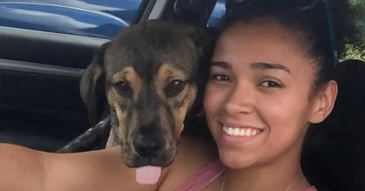 Aniah Blanchard smiles with her dog