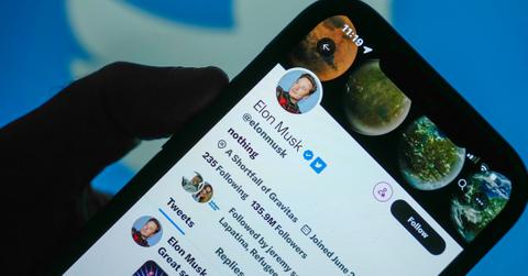 In this photo illustration the Twitter account of Elon Musk is seen on a mobile cellphone