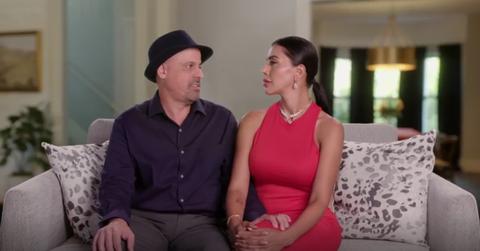 Gino and Jasmine sit on a couch on 90 Day Fiancé: Happily Ever After?
