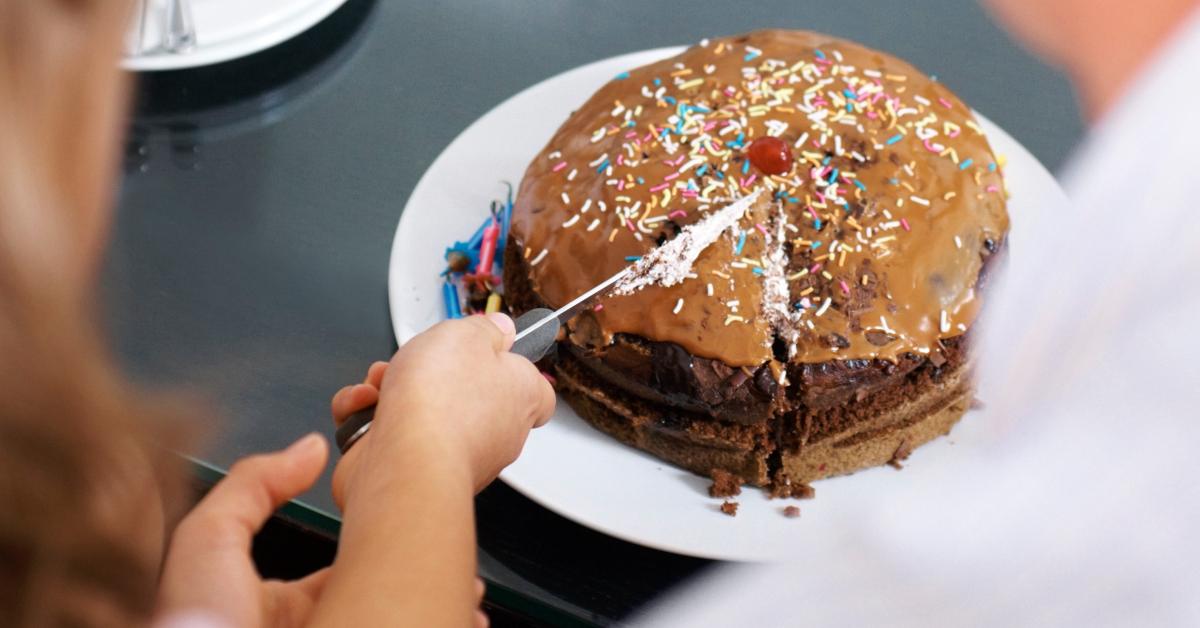 Birthday Cake Cut Using Plastic Knife Stock Photo, Picture and Royalty Free  Image. Image 21032024.