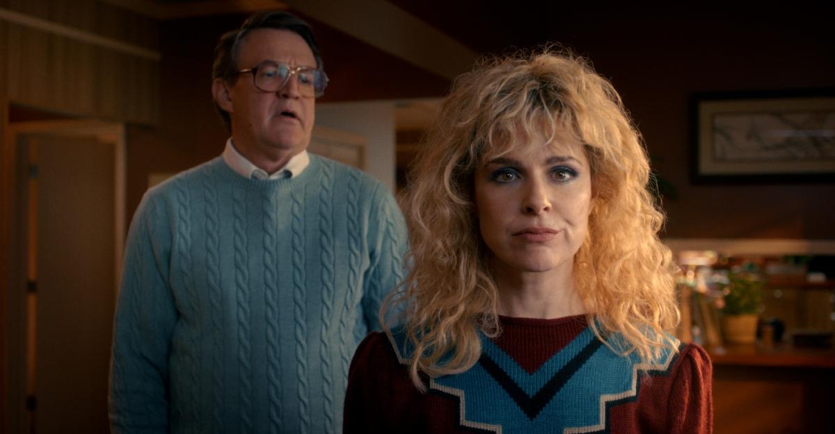 Ted Wheeler makes a comment to his wife, Karen, in Stranger Things.