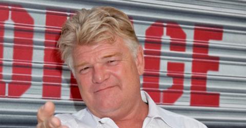 Dan Dotson from 'Storage Wars' standing in front of a storage locker
