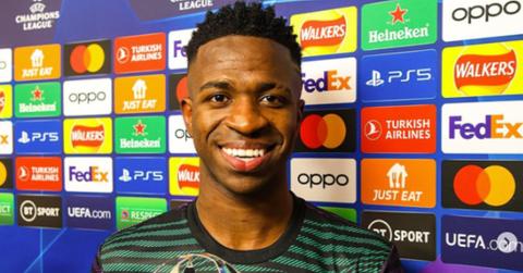 Vinícius Jr. holding a trophy