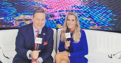 Ed Henry and Karyn Turk holding mics on 'American Sunrise.'