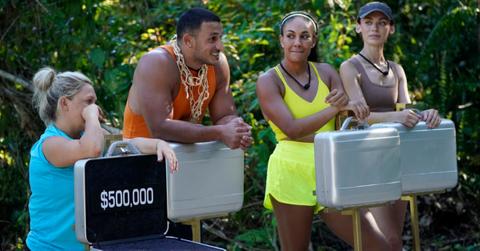 Season 1 cast of 'Deal or No Deal Island' holding silver suitcases