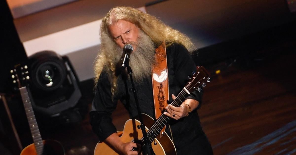 Jamey Johnson performing on stage.