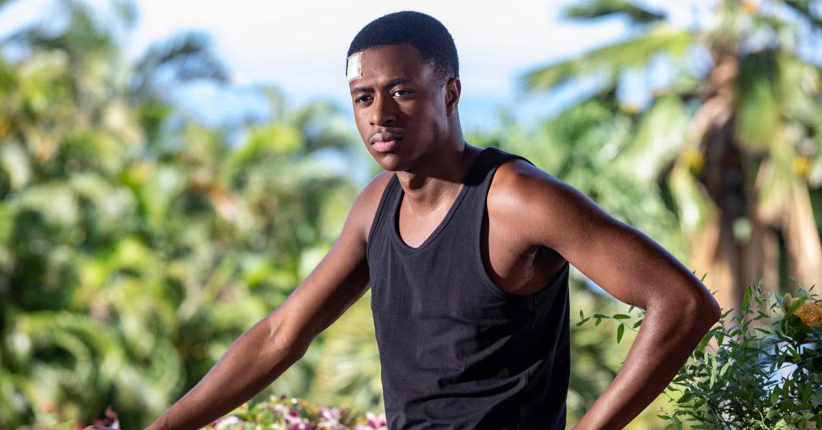 Marlon Pryce (Tahj Miles) in 'Death in Paradise' in black tank top