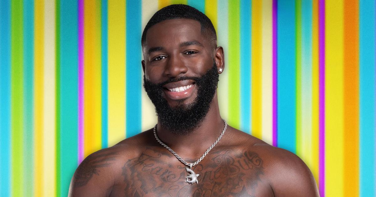 Coye Simmons poses shirtless for his official 'Love Island USA' Season 6 portrait.