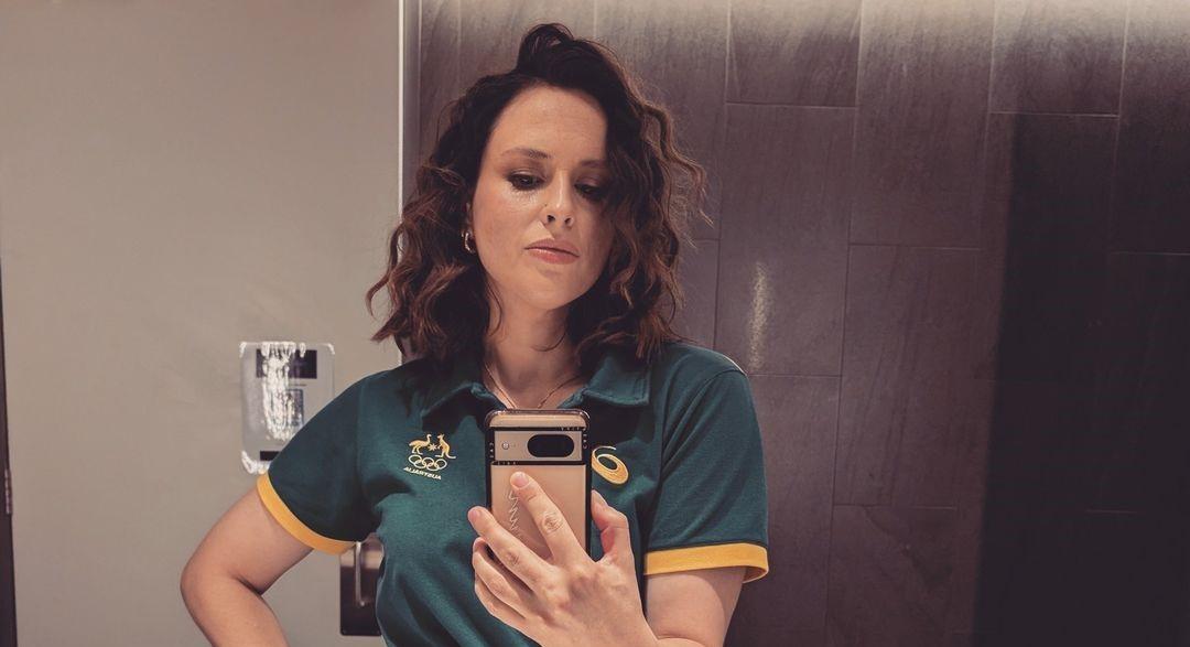 Rachael Gun showing her Olympic polo in a selfie