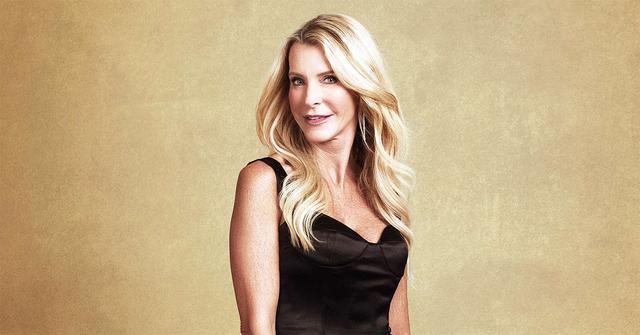 Joan Vassos posing for a photo for 'The Golden Bachelor.'