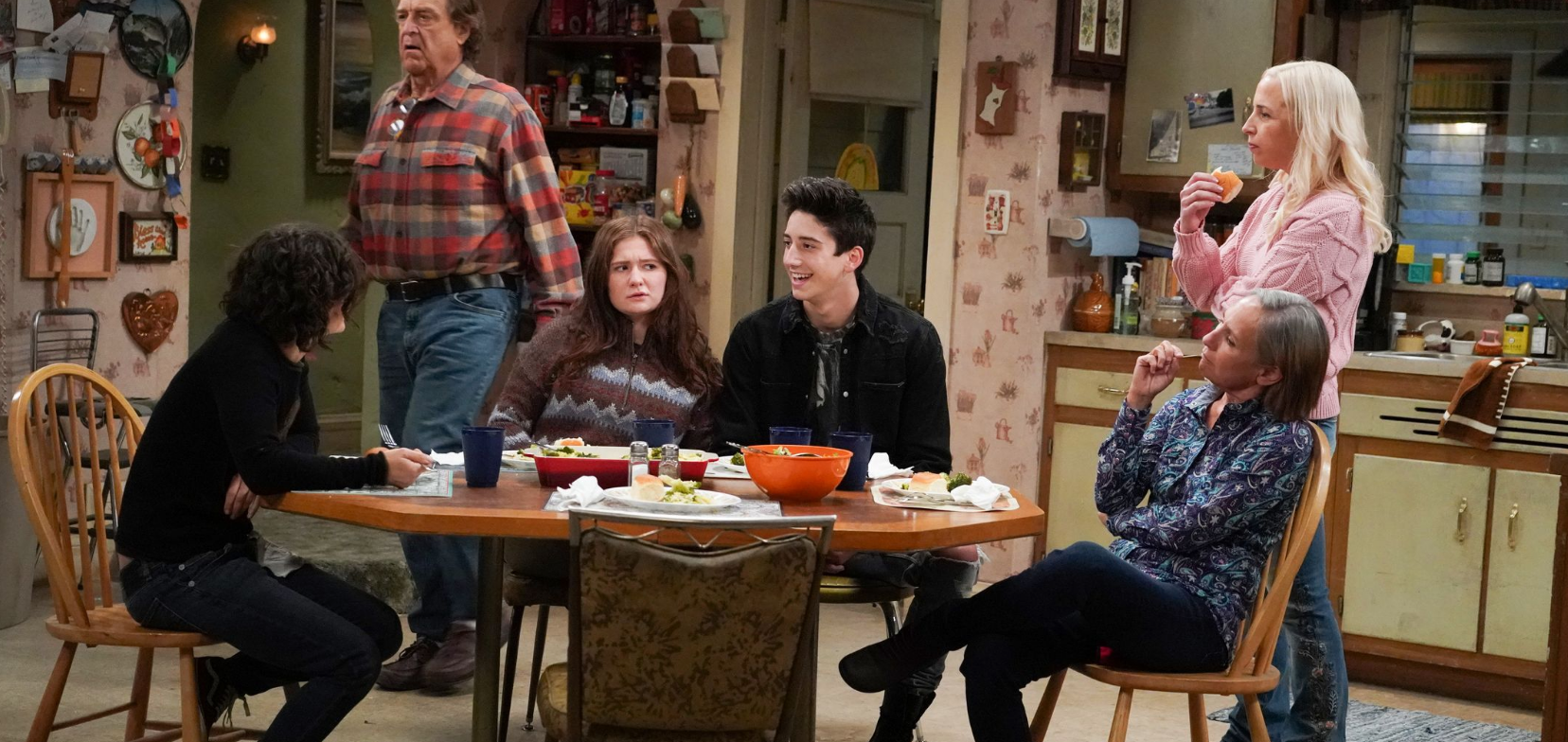 Harris' boyfriend Josh being grilled by the family on 'The Conners'.