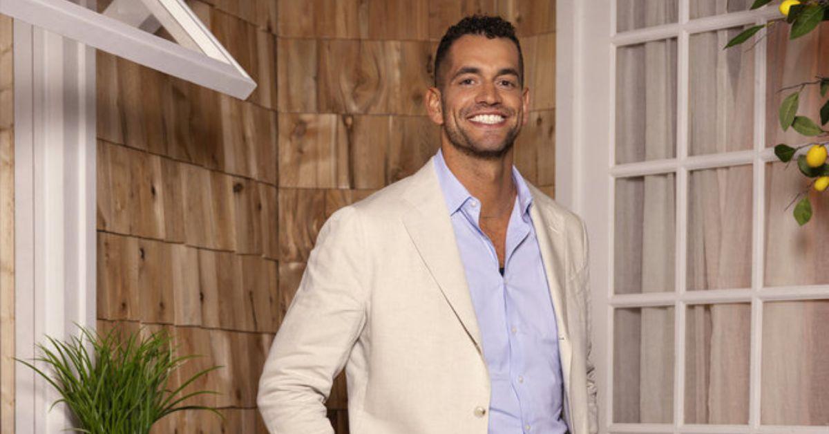 Jesse Solomon smiling and posing for 'Summer House' Season 8 reunion