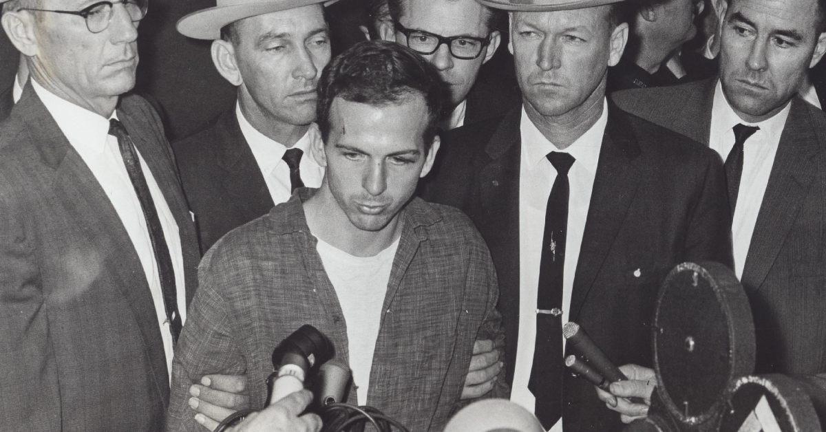 Lee Harvey Oswald being hounded by press.