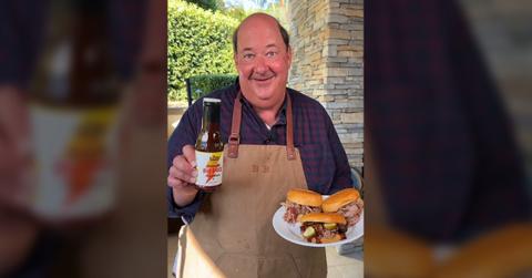 Brian Baumgartner holds 5-Hour ENERGY BBQ sauce